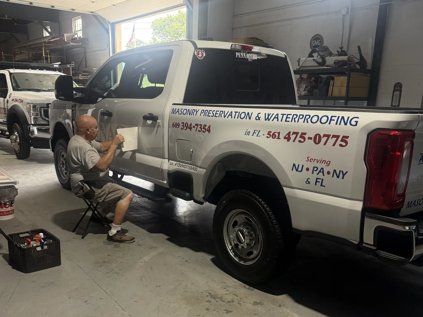 Anthony Pennacchi & Sons service truck lettered with masonry preservation and waterproofing signage at the company shop